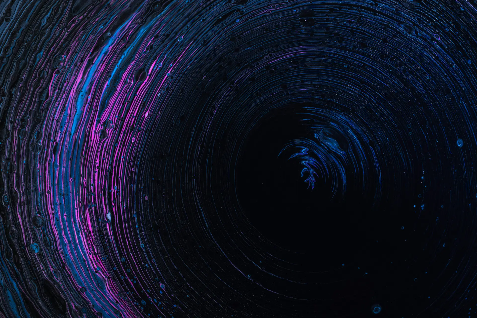 Deep abstract swirl of blue and violet layers
